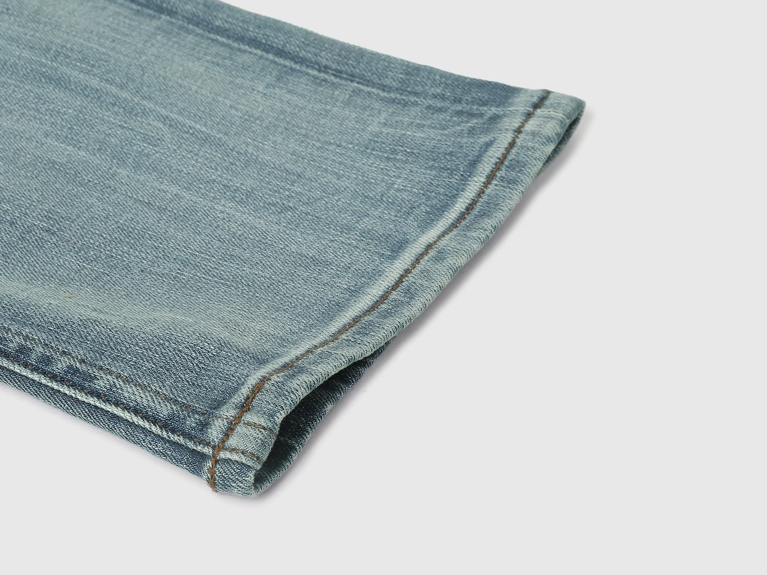 Solid Mid Rise Slim Straight Jeans