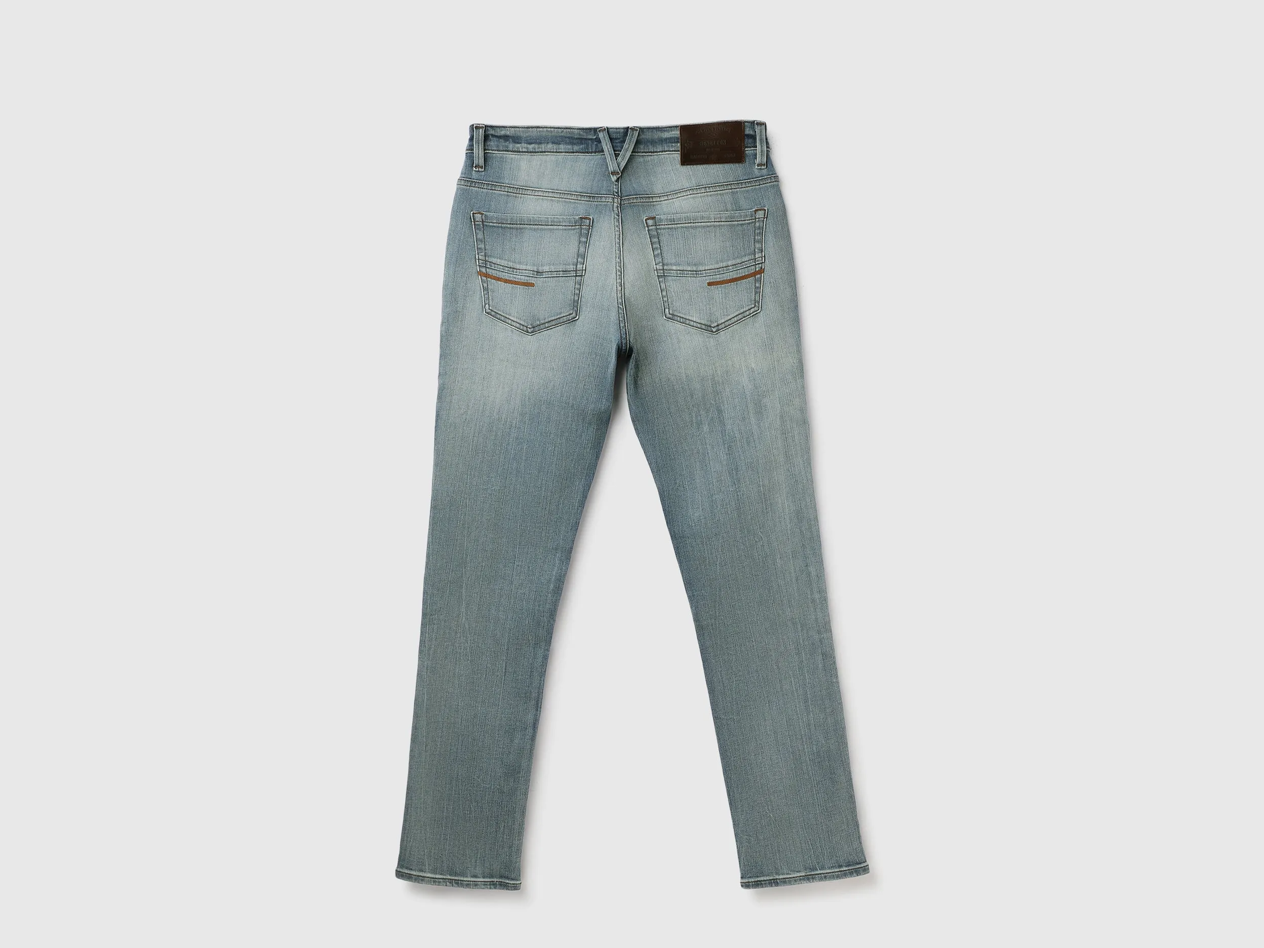 Solid Mid Rise Slim Straight Jeans