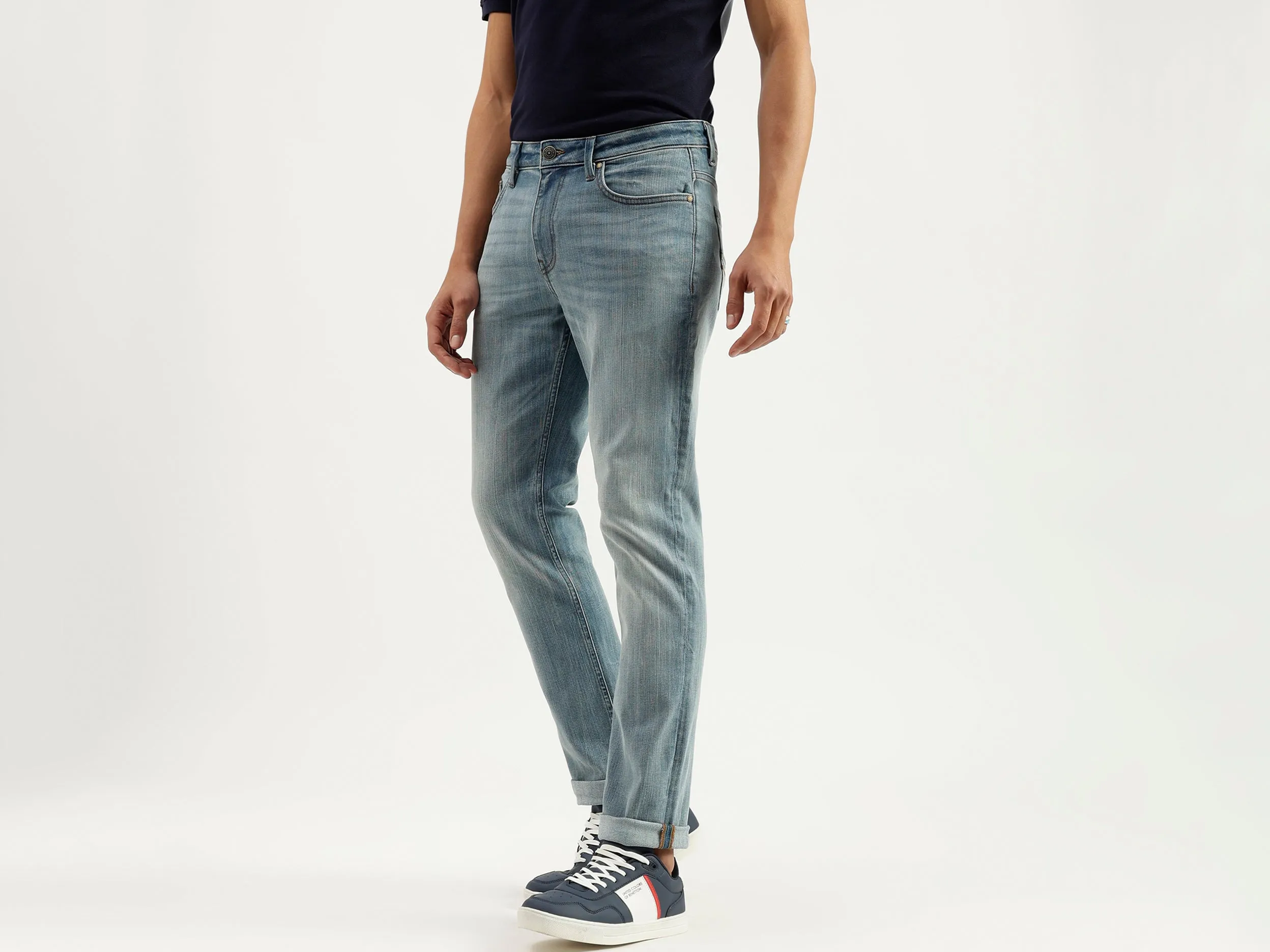 Solid Mid Rise Slim Straight Jeans