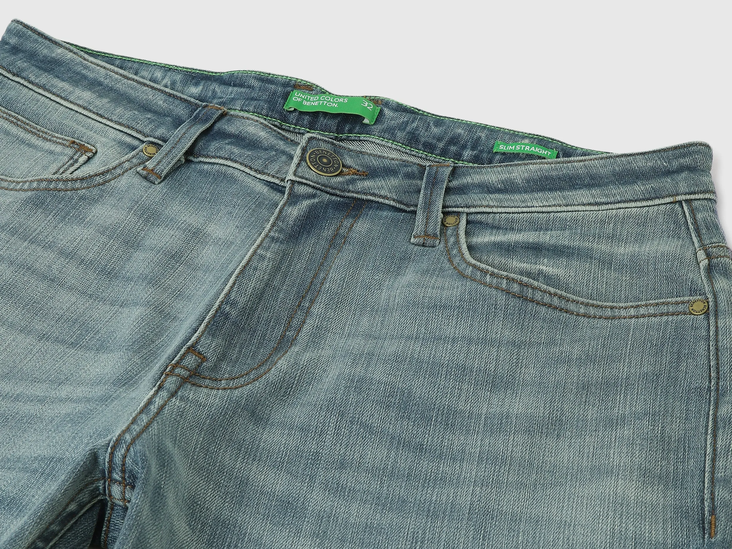 Solid Mid Rise Slim Straight Jeans