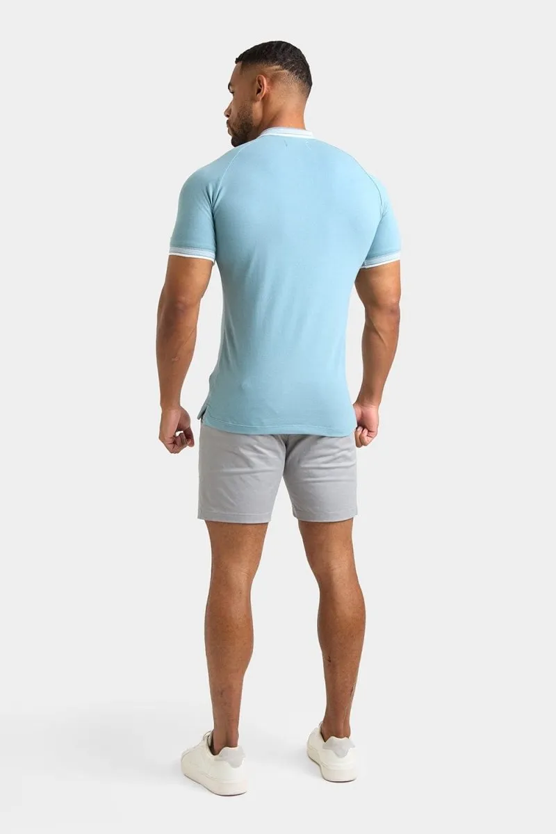 Stripe Tipped Zip Neck Polo Shirt in Aqua